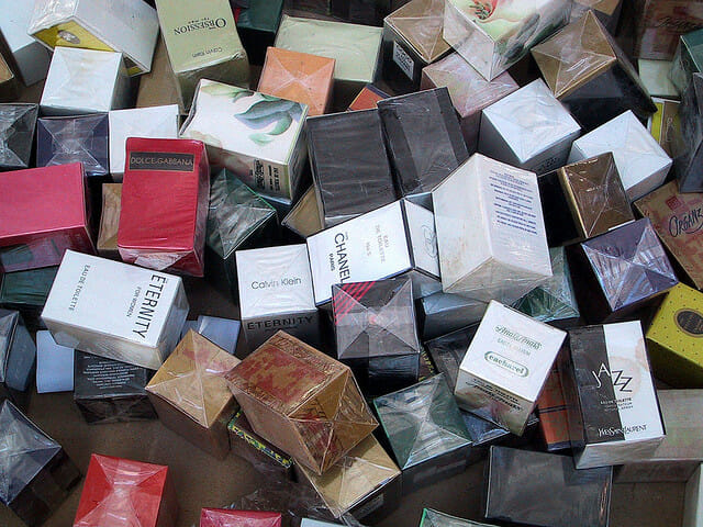 perfume boxes in a pile