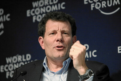 Nick Kristof speaking at Davos in 2010. / Photo by Monika Flueckiger