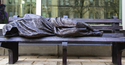 "Homeless Jesus" statue finds a permanent home in Buffalo. / michael_swan