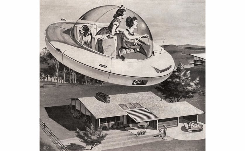 A 1950s-era mother and daughter ride home in a flying saucer with their groceries. A basset hound in the back seat looks out the clear canopy at the midcentury house below, where another flying saucer is parked in the driveway.