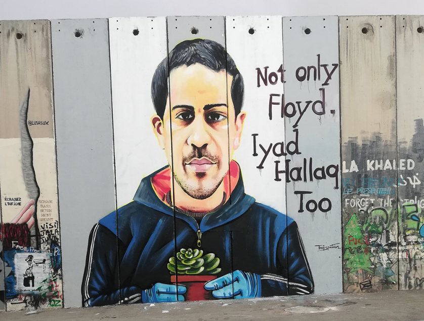 A mural depicting Eyad Hallaq in Bethlehem.