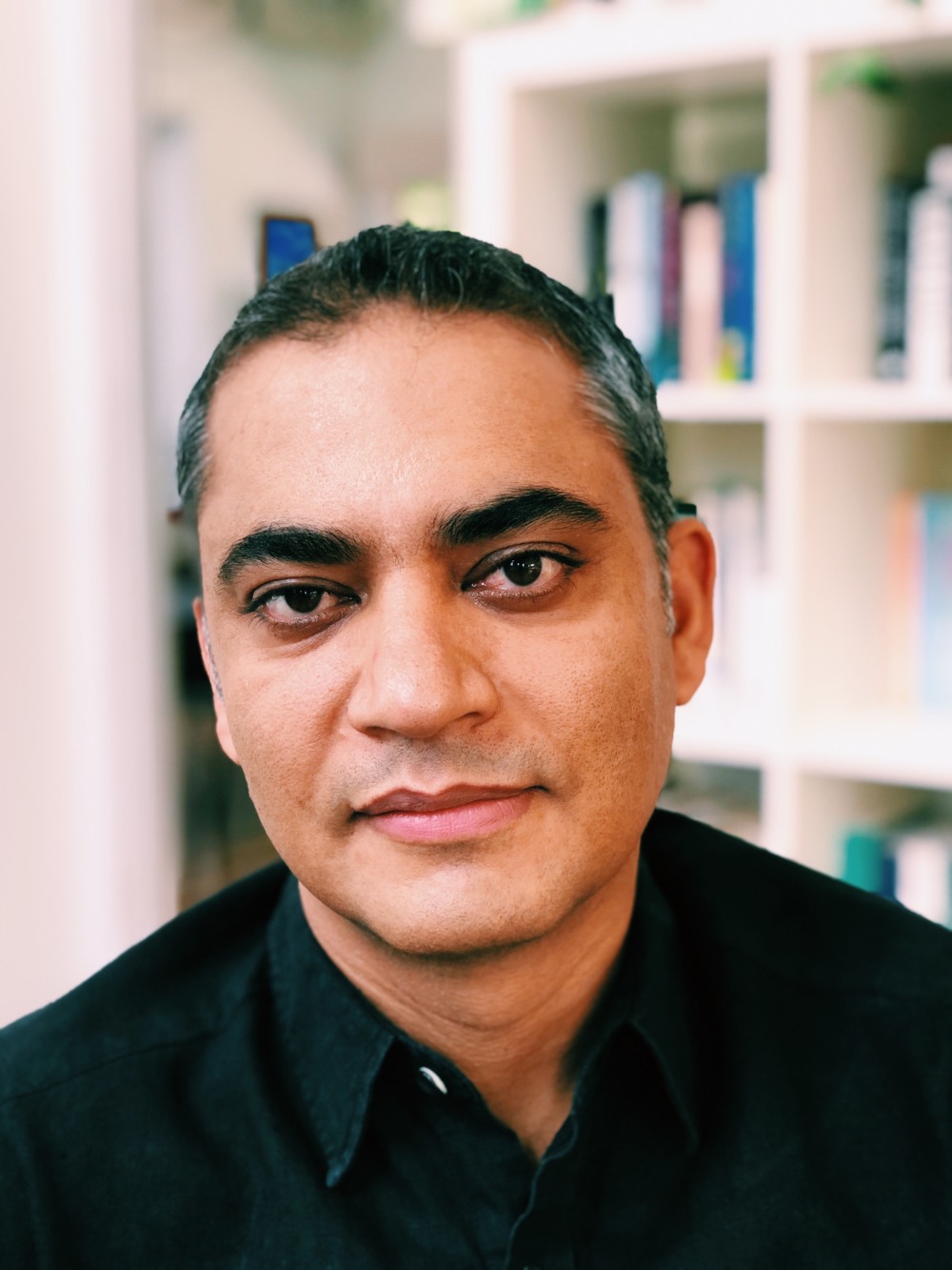 A forward facing photo portrait of Mohamad Junaid.