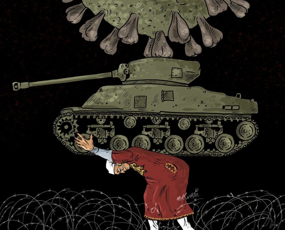 Reminiscent of the myth of the Greek Titan Atlas, a man holds a tank on his back as he trudges through a field of barb wire. On top of the tank is a giant Coronavirus.