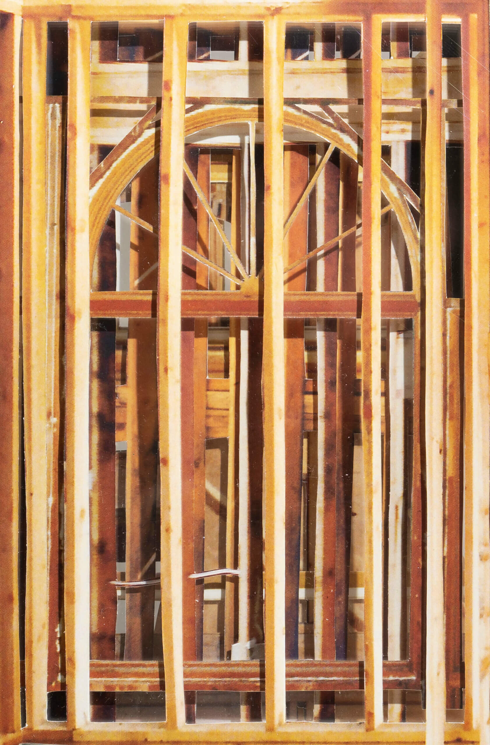 A collage of wooden struts and support beams reveals the frame of a house. The perspective is such that the house feels condensed; all that appears are familiar architectural shapes layed on top of each other, achieving a novel effect.