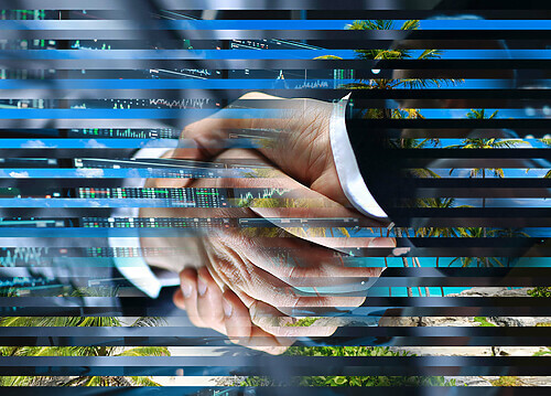 A color image of a handshake between two men wearing business suits is collaged over strips of beach scene and digital displays of stock exchange charts.