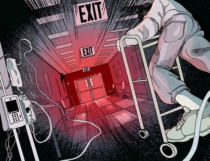 A long hospital hallway with double doors at the end.