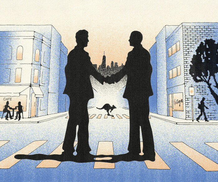 A silhouette of two men standing in the middle of a city crosswalk, shaking hands, with a kangaroo skipping across the opposite side of the street, with the New York skyline on the horizon.