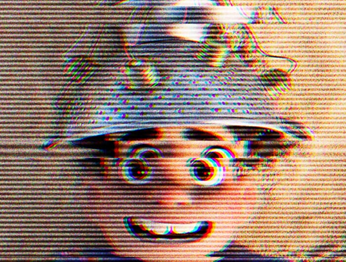 A distorted close-up of Elio from the titular Pixar film; he hears a improvised helmet made from a colander.