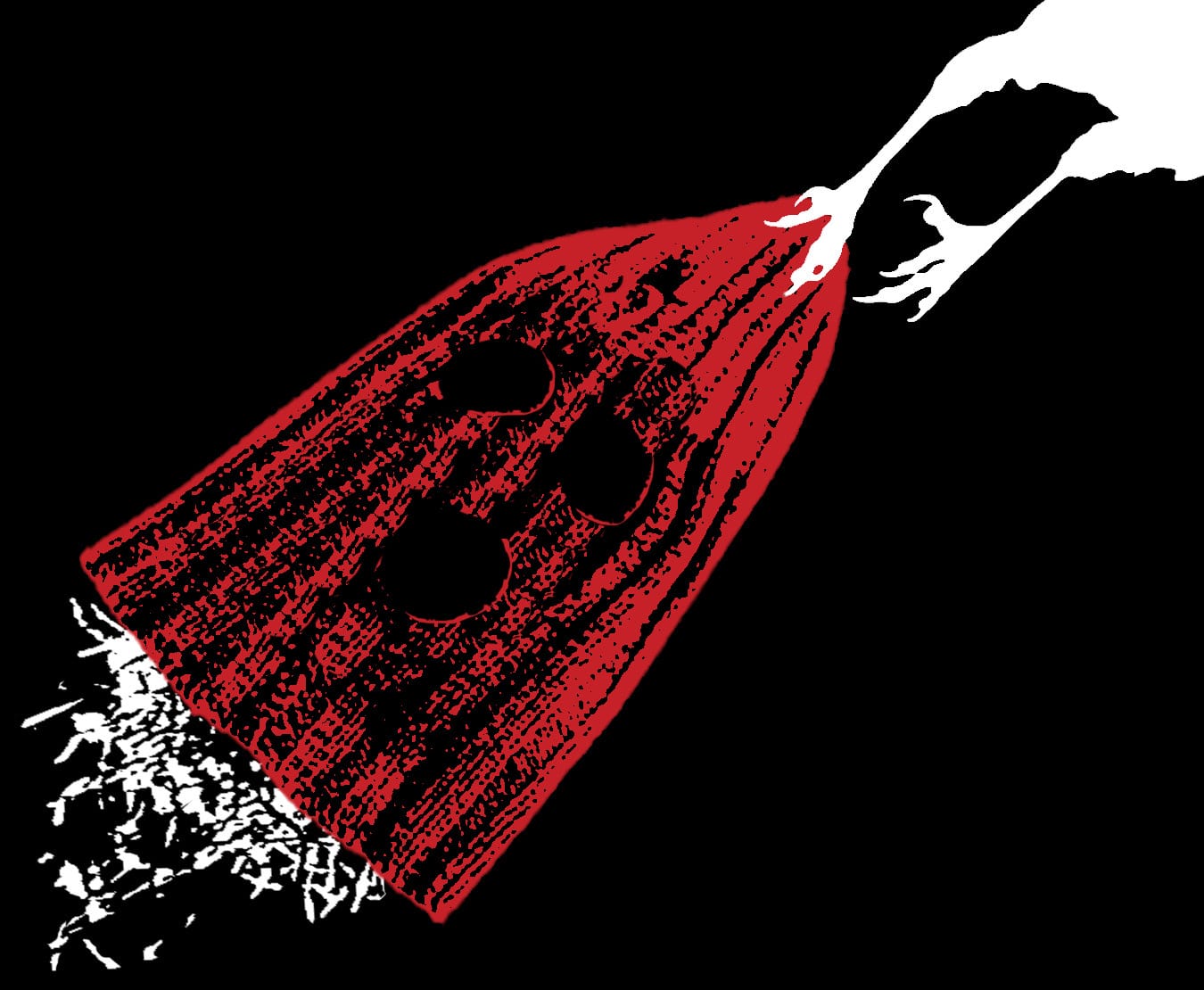 A bird’s talons are grasping a red balaclava with hay falling out of its bottom
