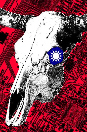 A black-and-white bull skull sitting atop a red circuit board.